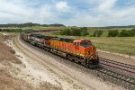 BNSF 5652 GE AC4400W, and BNSF 9777 EMD SD70MAC with a westbound empty hopper train descending Crawford Hill 